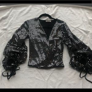 Sparkly black blouse